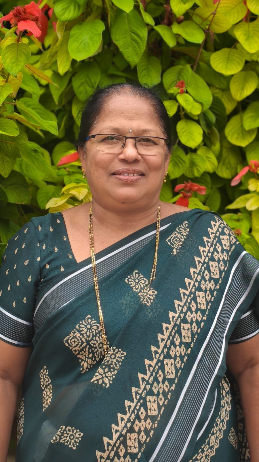 Mrs. Merlyn Tauro